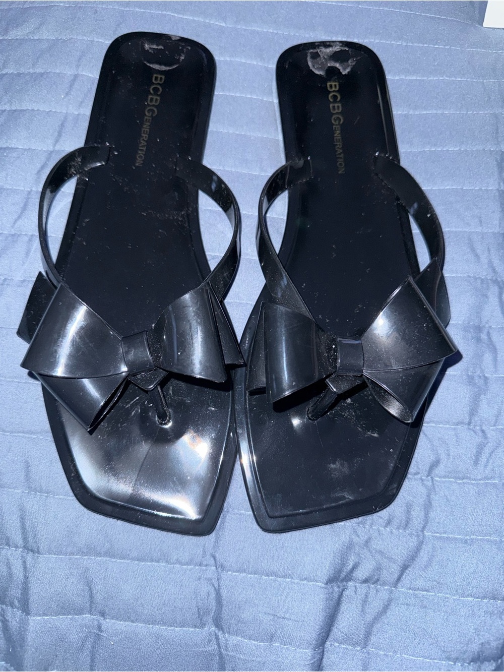 BCBGeneration Glossy Black Bow Thong Sandals